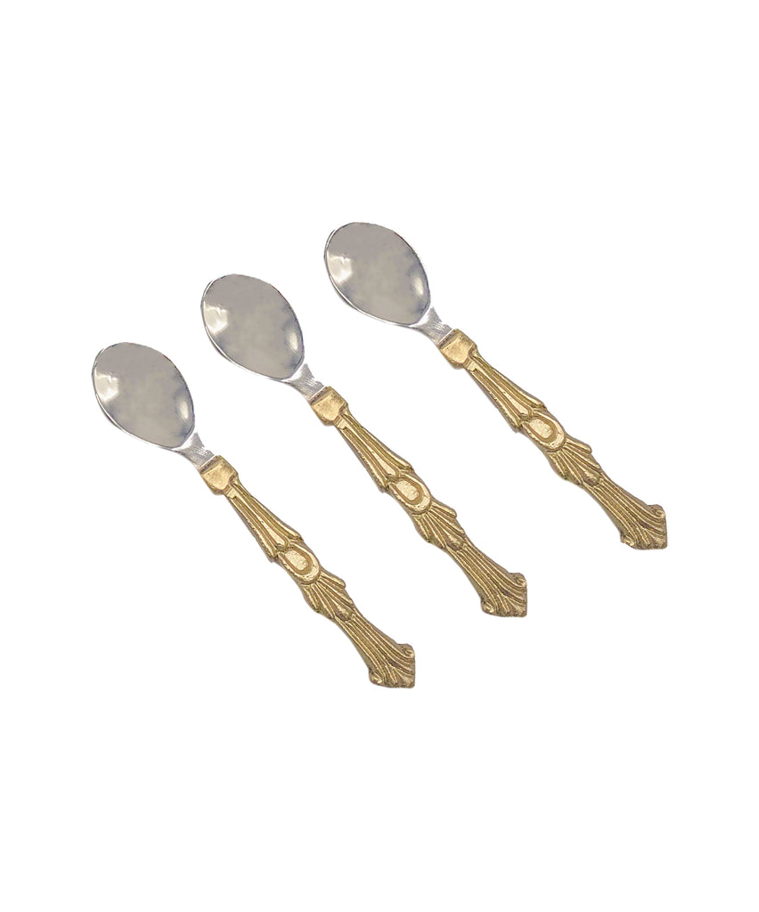 Set of 3 recycled brass condiment spoons with fancy filigree brass handles and silver spoon. White background.