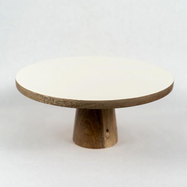 Traditional cake stand made from mango wood with a white enamel top and a nice chunky wood bottom. White background.