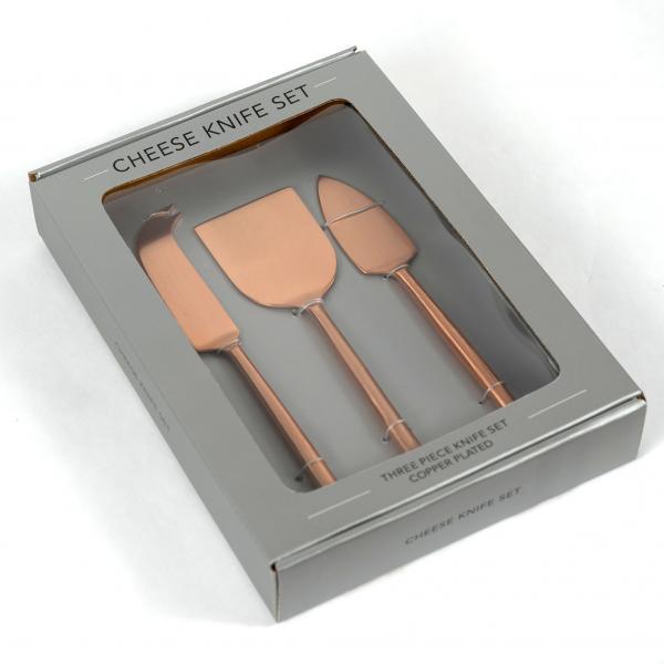 Three piece matte copper cheese knife set in a gray box.