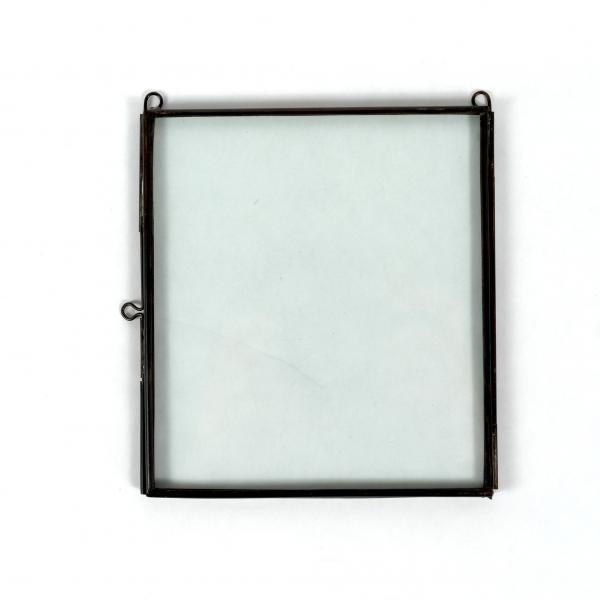 A simple hinged photo frame with a simple black border and two hanging loops at the top corners. White background.