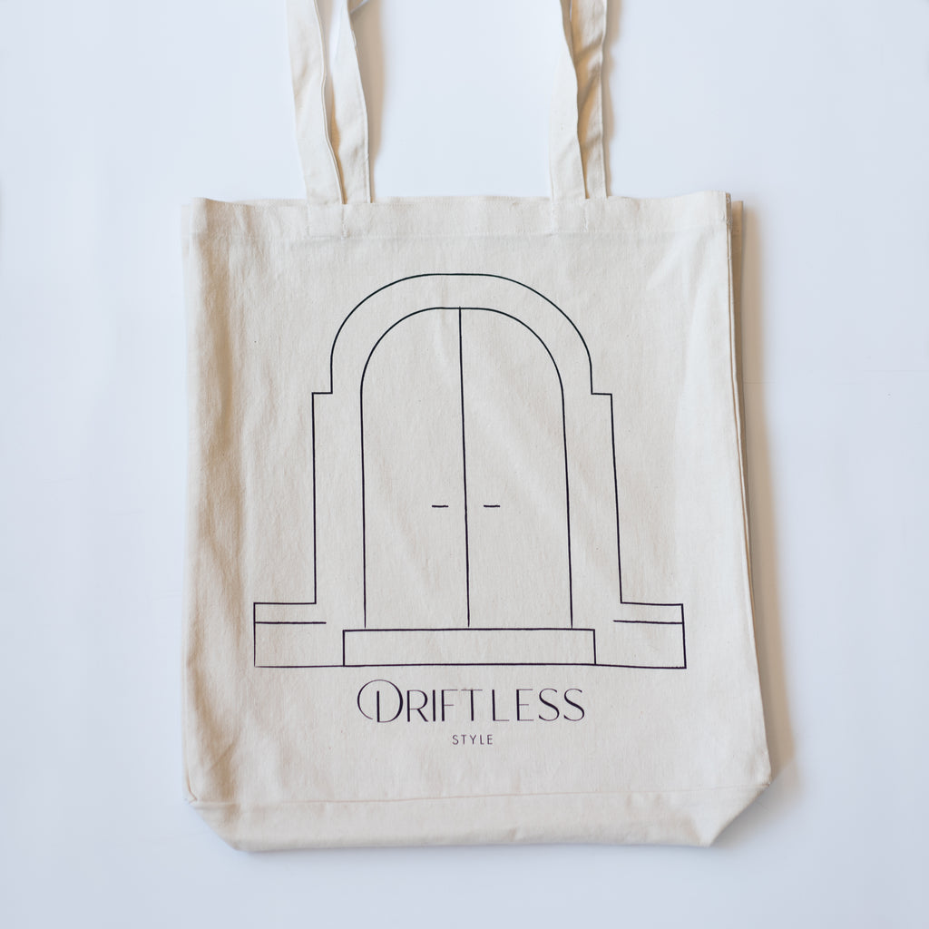 Cotton canvas tote bag with the new Driftless Style logo on the front.