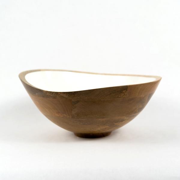 Large wavy topped bowl made from mango wood with a white enamel interior. White background.