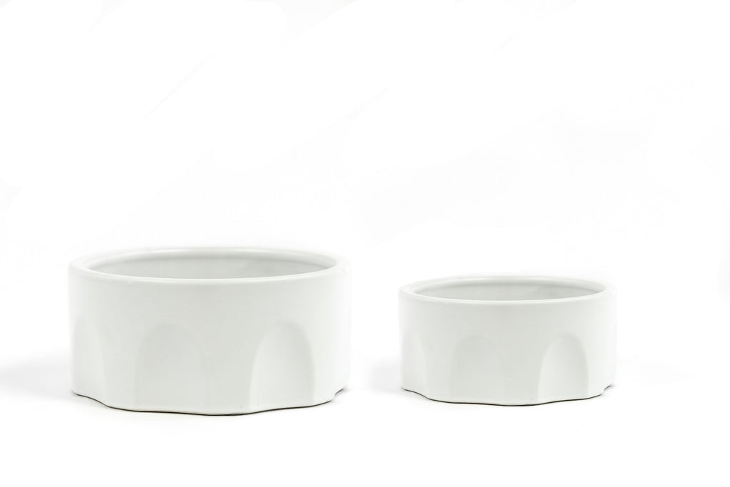 White Porcelain Bowls, in large and small, with arch design on the sides.