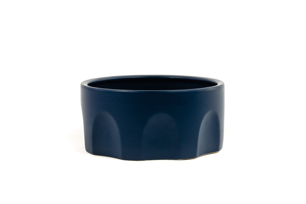 Small Midnight Blue Porcelain Bowl with arch design on the sides.