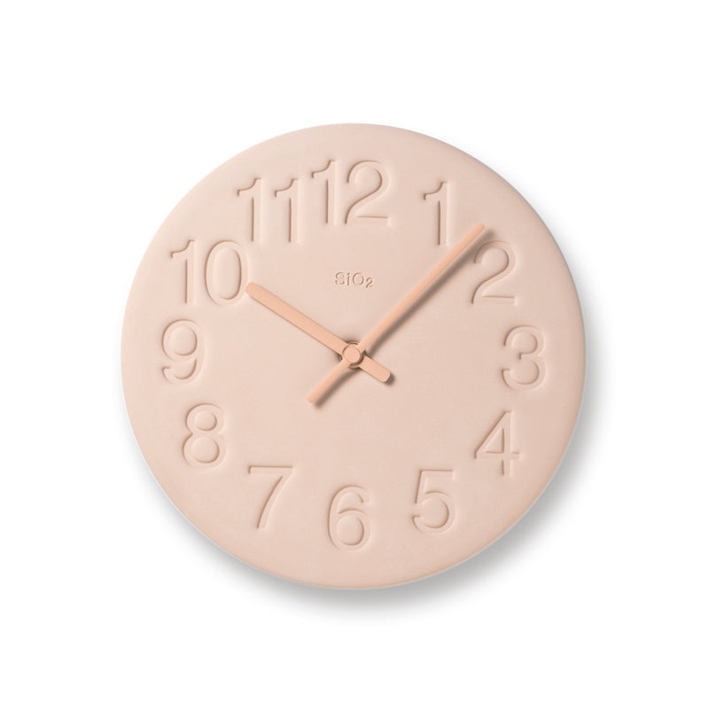Blush pink clock made from diatomaceous earth with engraved numbers + blush pink hands.