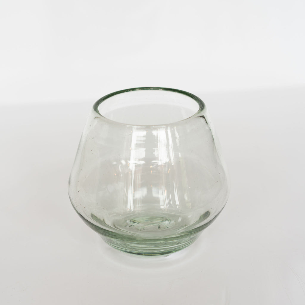 Handblown stemless wine glass in a slight diamond shape.